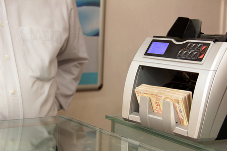 Money counting machineの写真素材