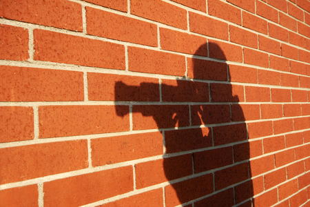 Wall and photographerの写真素材