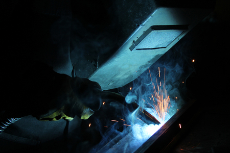 Welder works in an industrial company