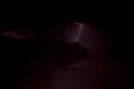 Lightning in the night dramatic skyの写真素材