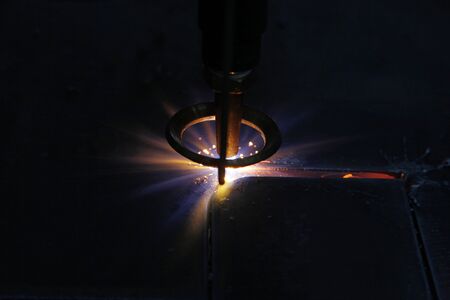 CNC Laser cutting of metal, modern industrial technology.