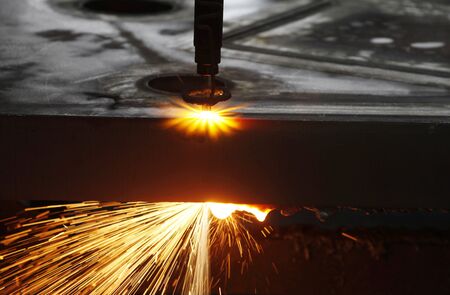 CNC Laser cutting of metal, modern industrial technology.