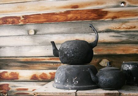 black pot and teapot in the shedの写真素材