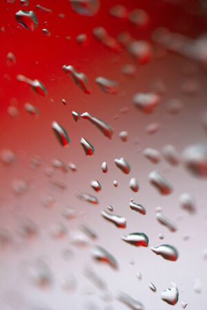 raindrops on glass texture abstract backgroundの写真素材