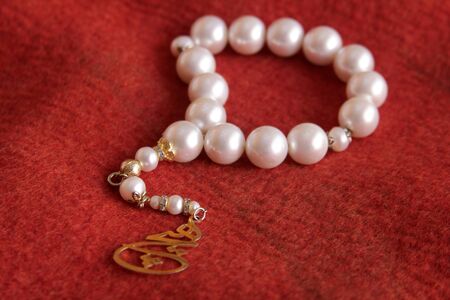ornate white pearl rosary backgroundの写真素材