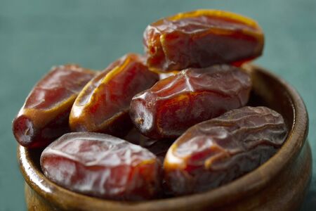 Dried date fruit in the plateの写真素材