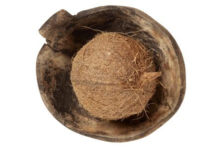 coconut in old antique wooden plate