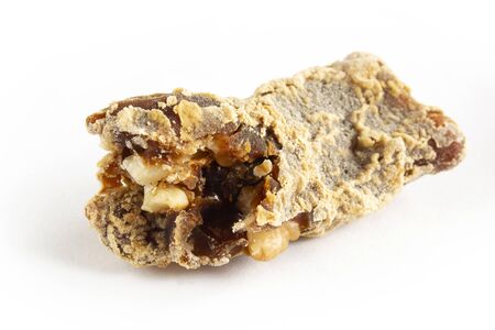 Walnuts on a string dipped in starch grape molasses. Churchkhela. Walnut sujuk.