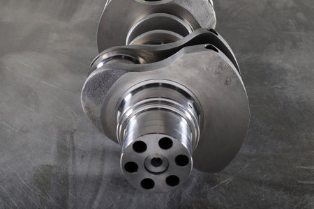 New engine crankshaft. Spare part.