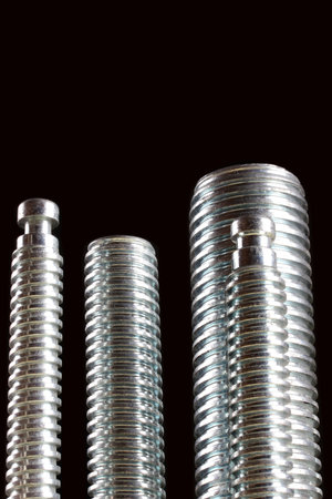 Newly manufactured large screws. Close up.