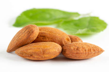 A pile of Almonds, isolated on a white background.