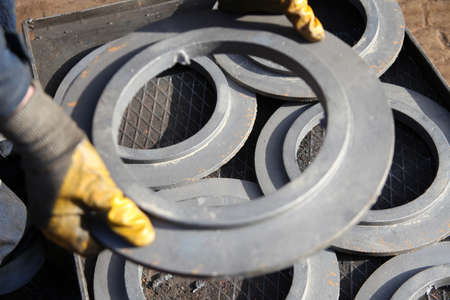 worker and newly manufactured pulleys
