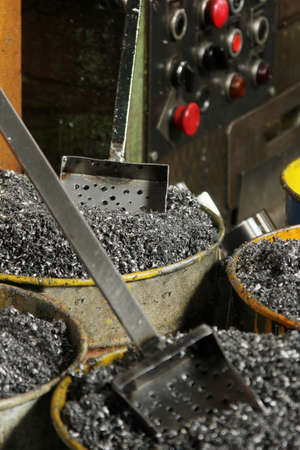 metal shavings inside the metal bucketの写真素材