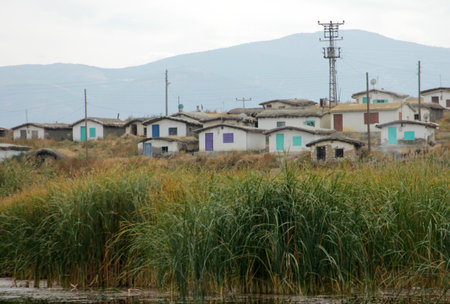 adobe fishing huts by the lakeの写真素材