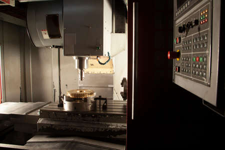 Metalworking CNC milling machine. Cutting metal modern processing technology.