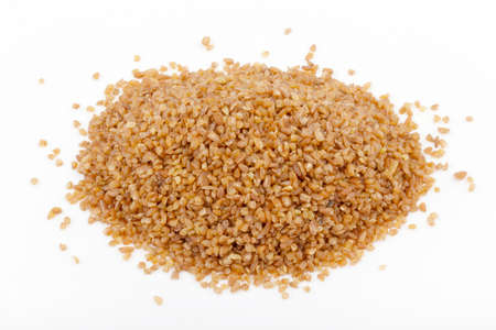 brown bulgur on a white backgroundの写真素材