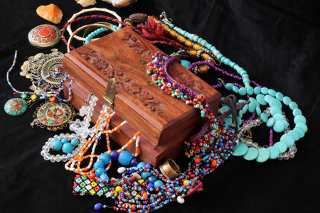 wooden jewelery chest and various jewelriesの写真素材