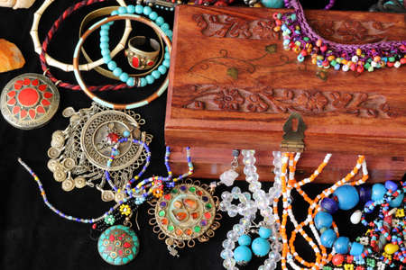 wooden jewelery chest and various jewelriesの写真素材