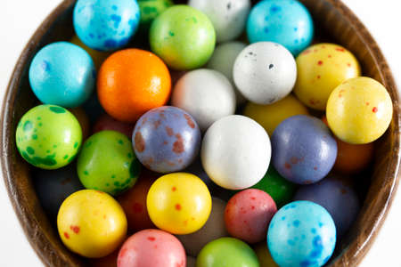 multicolored speckled and chocolate candies