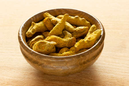 turmeric sticks in bamboo plate