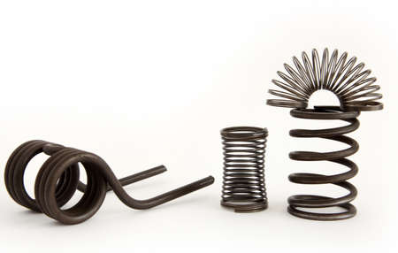 assorted steel spring kits on a white background