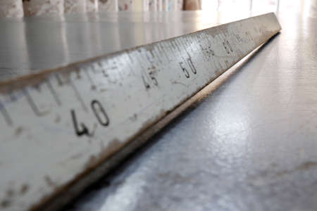 wooden old ruler close upの写真素材