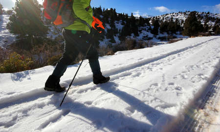 A man climbing. winter sports.の写真素材