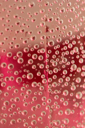 close-up water drops, colorful backgroundの写真素材