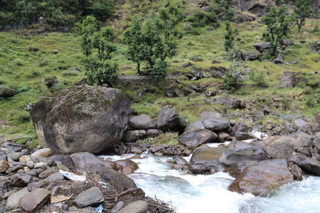 River passing through under the rocks