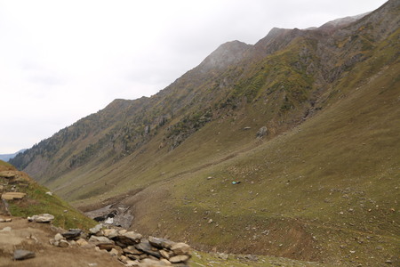 Beautiful view of mountains under cloudy skyの写真素材