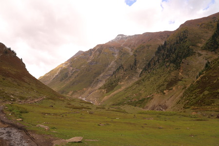 View of big mountains under cloudy skyの写真素材