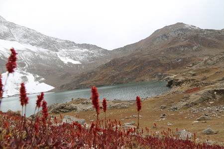 Beautiful bue lake with snow mountainの写真素材