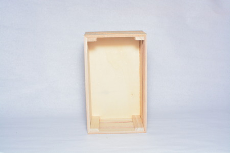 miniature of wooden pallet or box. Isolated on white background. (visible slightly soft focus).の写真素材