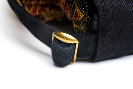 Close up black cap, or snapback isolated on white background.
