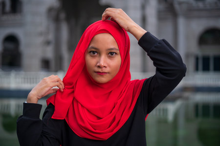 Beautiful young woman in hijab smile in the carの写真素材
