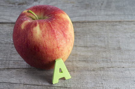 Red apple with alphabet Aの写真素材