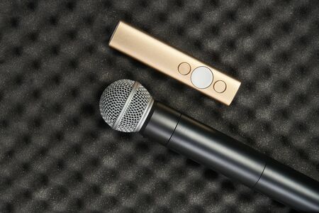 radio microphone Item stand on foam rubber color greyの写真素材