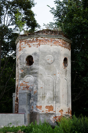 Old abandoned water tower in the park. Russia.の写真素材