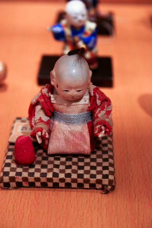 Clay dolls of Japanese handicrafts on the tableの写真素材