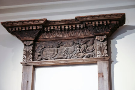 Wooden carved door in a Russian house, closeup of photo