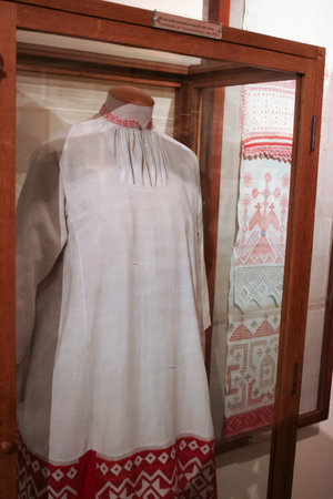 Traditional embroidery on a mannequin in a shop windowの写真素材