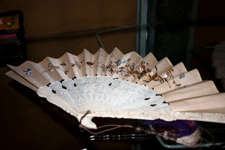 Hand made paper fan for sale at a souvenir shop in Tulaの写真素材