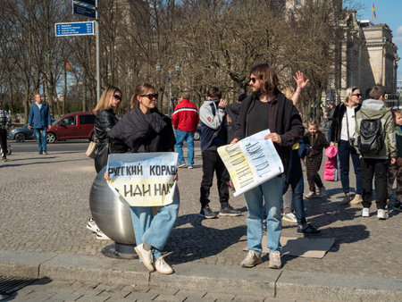 Berlin, Germany - 03/27/2022: Protest against Russian invasion of Ukraine against war near Brandenburg Gateのeditorial素材