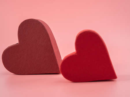 Heart shaped boxes on a pink background. Hearts on a pink background.