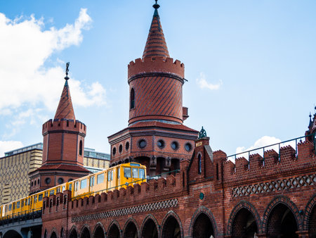 Yellow train in Berlin. Train at the station. Yellow train on the Oberbaum Bridge in Berlin, Germanyのeditorial素材