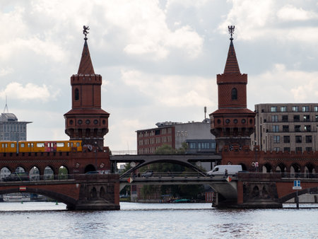 Yellow train in Berlin. Train at the station. Yellow train on the Oberbaum Bridge in Berlin, Germanyのeditorial素材