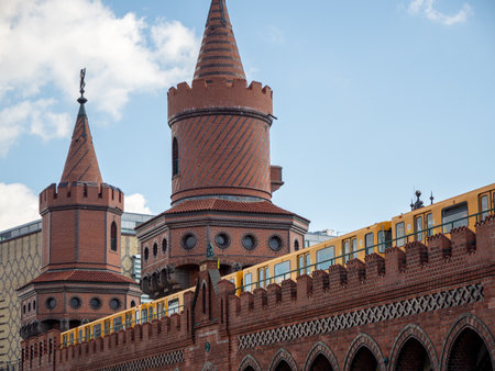 Yellow train in Berlin. Train at the station. Yellow train on the Oberbaum Bridge in Berlin, Germanyのeditorial素材