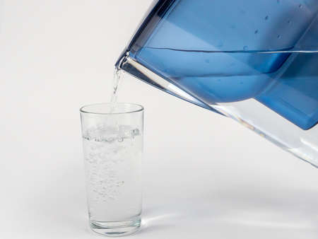 Jug with water filter made of transparent plastic. Drinking water filter.の写真素材