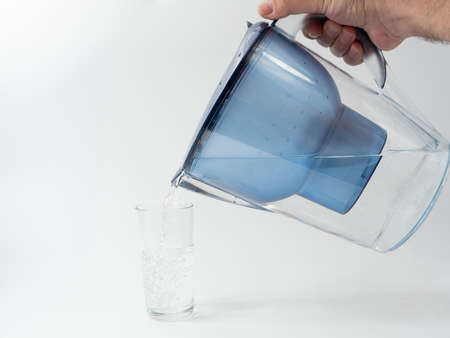 Jug with water filter made of transparent plastic. Drinking water filter.の写真素材