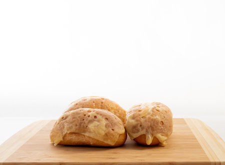 Bun with cheese. Fresh buns stuffed with cheese. Freshly baked cheese buns.の写真素材